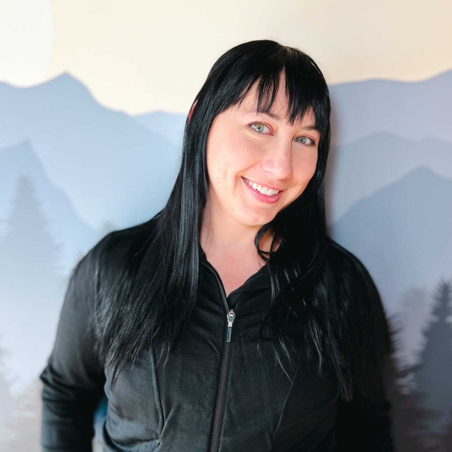 Portrait of Rachel, a professional stylist at Masque by Mask Balanced Skincare, showcasing their expertise and style.